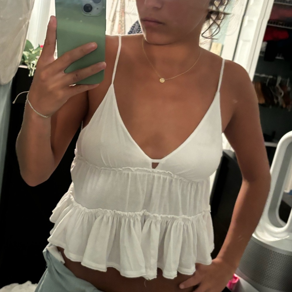 White flowy tank.